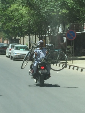 Why cycle when you can bring your bicycle on a motorbike?